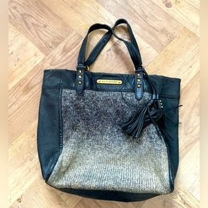 Beautiful vintage black Juicy Couture leather and knit handbag with tassels